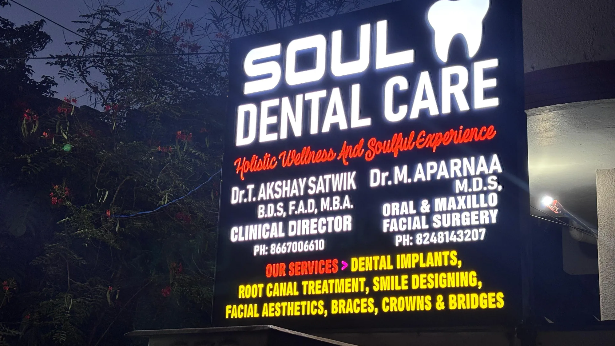 The sign, lit.